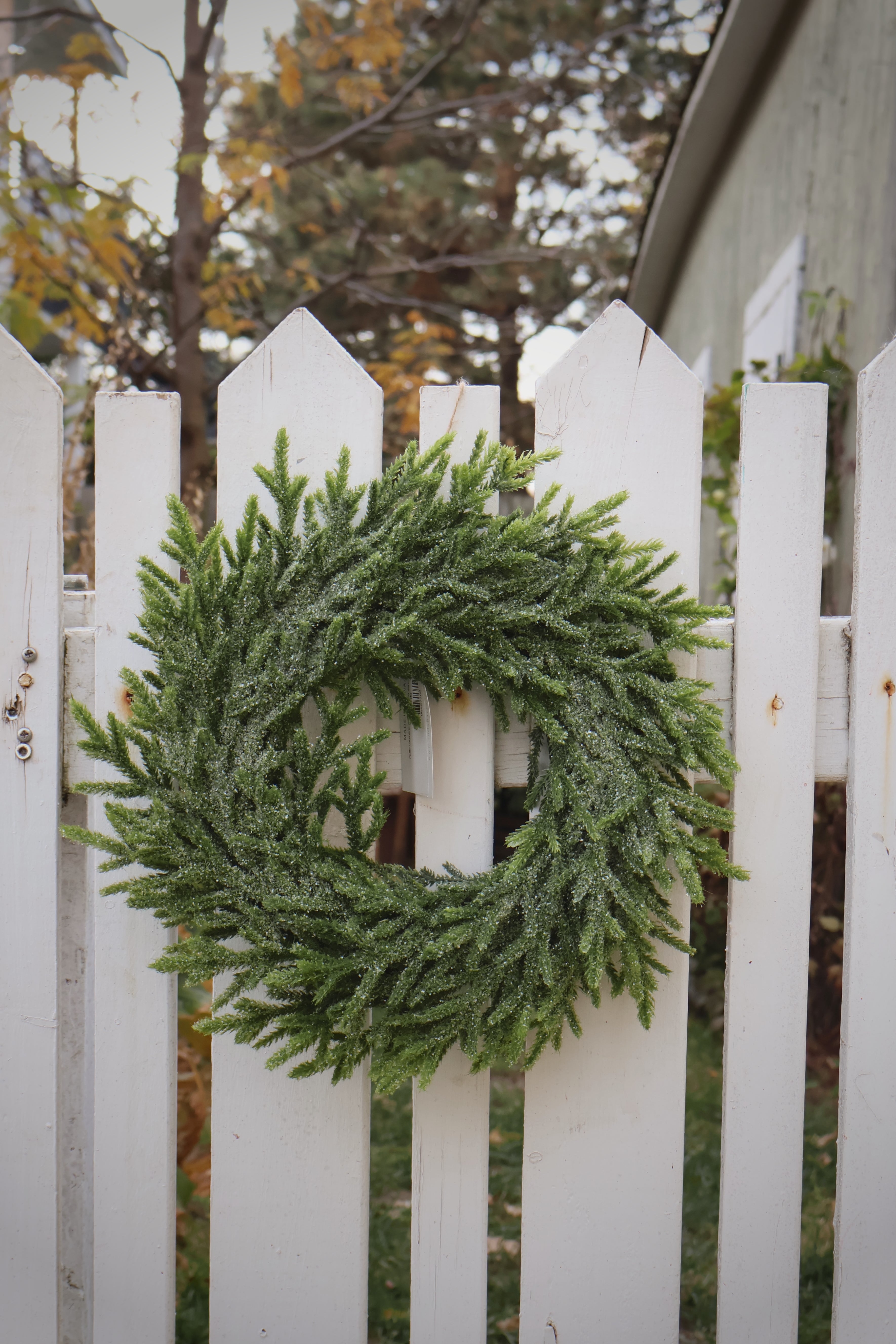 Petite couronne de Noël en faux sapinage avec brillants